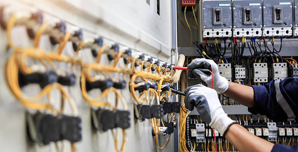 Professional Electrician technician working in Lauderdale-by-the-Sea, FL